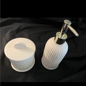 Urban Outfitters bath accessories set; soap dispenser and small canister.